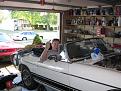 John testing the passenger seat in the MGB